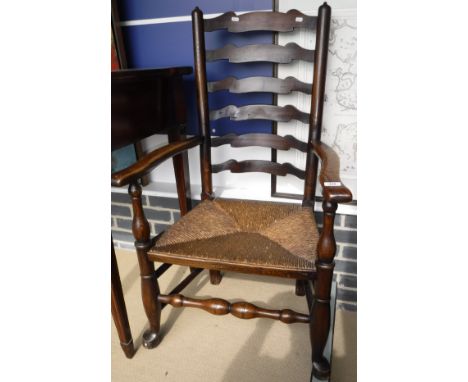 An ash ladder back rush seat chair in the 18th Century North Country manner