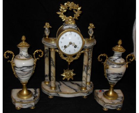 A 19th Century French alabaster cased clock garniture, the eight day movement with circular enamel dial and Arabic numerals b