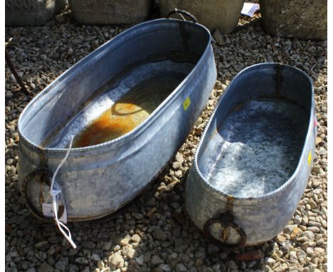 A long metal planter, together with a smaller planter*