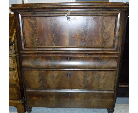 A 19th Century French mahogany secretaire à abattant, the shallow caddy top over a front compartment fall enclosing a fitted 