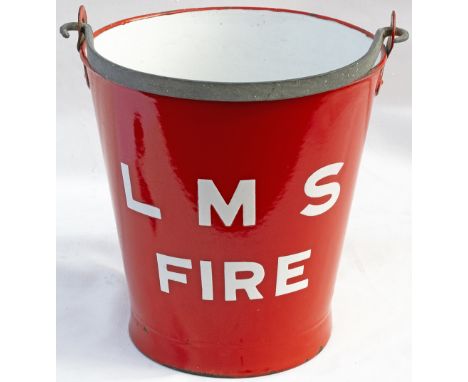 An enamelled red steel fire bucket with LMS FIRE enamelled in white on the front. A rare item not seen by us before . In very