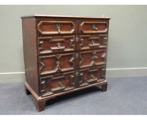 A Charles II and later chest of two short over three long drawers on bracket feet, 92 x 90 x 48cm