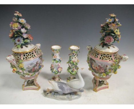 A pair of Meissen style floral encrusted vases and covers, 34cm high; a pair of floral encrusted vases and a Royal Copenhagen