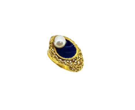 A modern enamel and pearl ring, set with a 6.2mm cultured pearl to one side, size O, unhallmarked, stamped '750', weight 6.4g