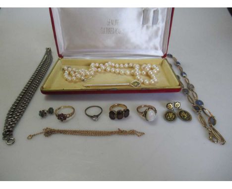 A collection of jewellery including a stick pin, stamped '9ct', an opal ring stamped '9CT', a necklet tested as 9ct gold, two