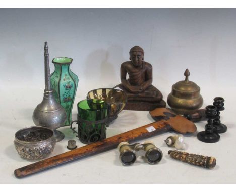 A glass walking stick, two other walking sticks, a Malay Kris, A carved handle, an enamel vase, a carved wooden Buddha, Macqu