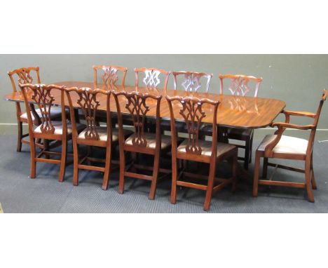 A George III style mahogany three pedistal dining table and twelve Chippendale style chairsCondition report: Three pedestals 