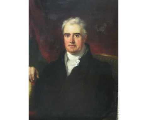 Circle of John Partridge (British, 1789-1872), Portrait of Mr Wickham, half-length, seated, with his right hand resting upon 