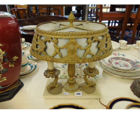 An ormulu lamp on marble base