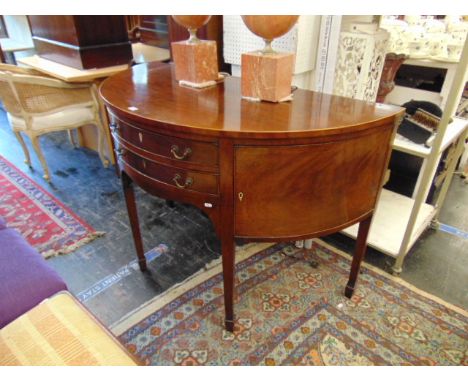 A Georgian demi lune two drawer console