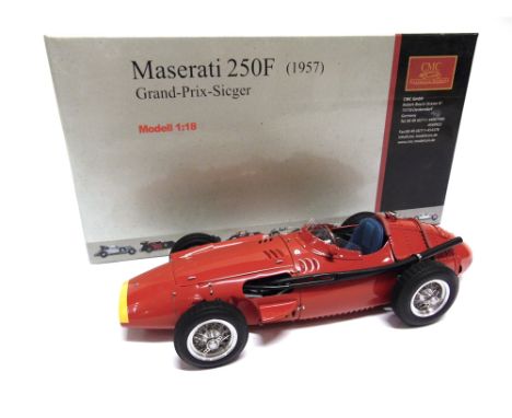 A 1/18 SCALE CMC NO.M-051, 1957 MASERATI 250F  red (windscreen cracked), boxed. 