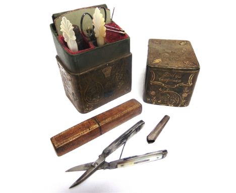 A 19TH CENTURY 'LADY'S COMPANION' GILT-TOOLED LEATHER NECESSAIRE  containing a thimble, scissors, bodkin, button hook, stilet