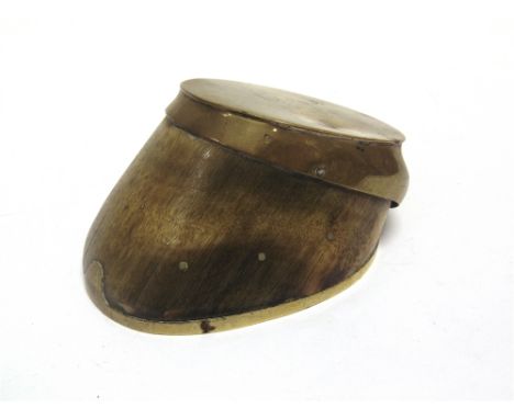 A GREAT WAR BRASS-MOUNTED HORSE'S HOOF  engraved 'Dick / Aged 30 / Great War  Rhine Army  Aldershot / 1914-1928'. 