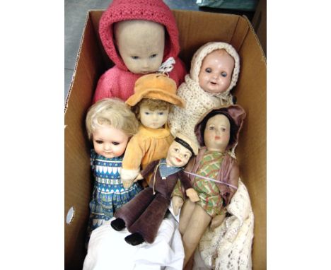 SIX ASSORTED DOLLS  comprising a German composition socket head doll, with blonde hair, sleeping grey glass eyes, and an open