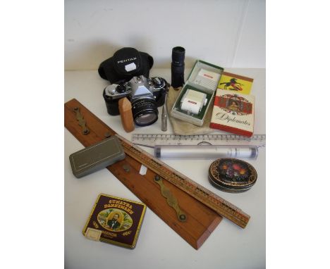Vintage boxwood folding ruler, another ruler, Pentax camera, light meters, monocle etc 