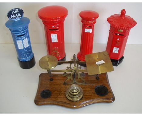 Selection of novelty ceramic post box money boxes and an Edwardian set of postal scales 