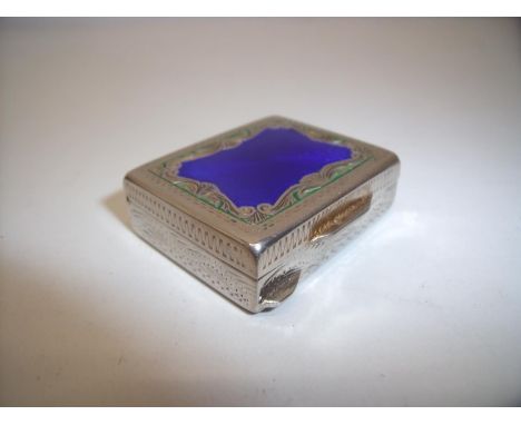 Continental silver gilt and enamel snuff box of rectangular form with hinged top and engraved detail (4cm x 3cm x 1.2cm) 