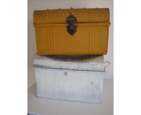 Two small vintage tin trunks 