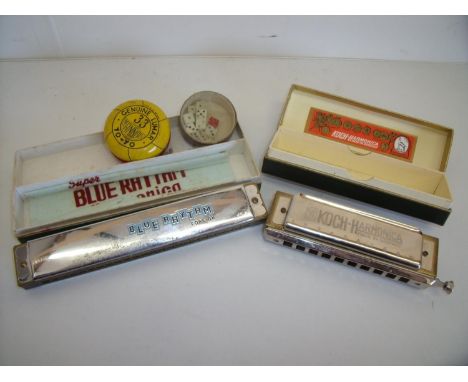 Boxed Blue Rhythm Harmonica and a Koch-Harmonica, a Genuine Lumar 33 Beginners Yo-yo and a selection of dice 