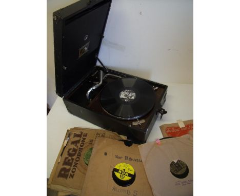 Portable wind-up His Masters Voice record player and a large selection of various classical and other records 