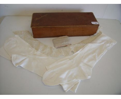 Vintage rectangular leather 'Stockings' box containing a selection of various stockings, lace edging etc (36cm x 13cm x 7cm) 