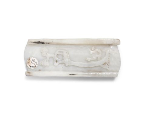 A WHITE JADE WRISTREST CARVED IN TWO SIDES BAMBOO AND FLOWERS民国 白玉双面雕花、竹纹臂擱China, Republic periodSize: 16.1 x 6.4cm Condition