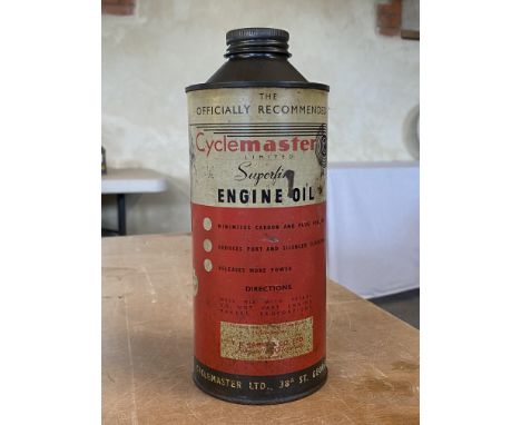 A Cyclemaster Limited Superfine Engine Oil cylindrical quart can.