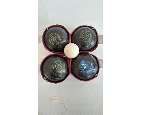 Set of four Almark "Crusader" lawn bowls with jack