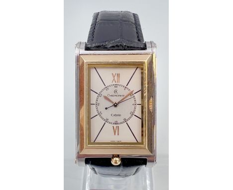 CHRONOSWISS. Cabrio. Herrenarmbanduhr. Schweiz.Circa 35 mm x 27 mm Gehäusemaße. Automatik. Werk läuft. Ref. 2617. Rechteckige