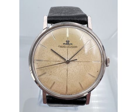 JAEGER-LECOULTRE. Herrenarmbanduhr. Schweiz.Circa 34 mm Gehäusedurchmesser ohne Krone. Handaufzug. Werk läuft. Rundes Edelsta