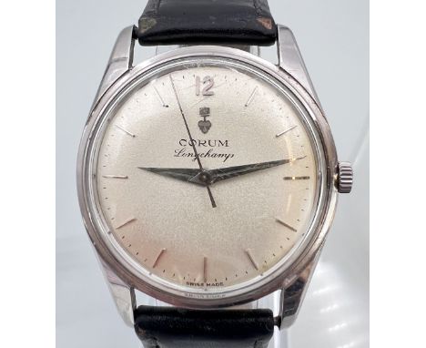 CORUM. Longchamps. Herrenarmbanduhr. Automatik. Schweiz.Circa 33 mm Gehäusedurchmesser ohne Krone. Rundes Edelstahlgehäuse mi