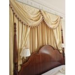 A mahogany bed headboard in George III style. Of compound serpentine arched outline with a moulded
