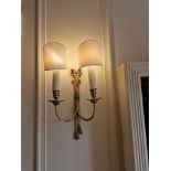 A pair of antiqued brass French style wall appliques twin arm bow and ribbon design backplate 40cm (
