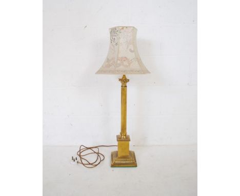 A brass Corinthian column table lamp