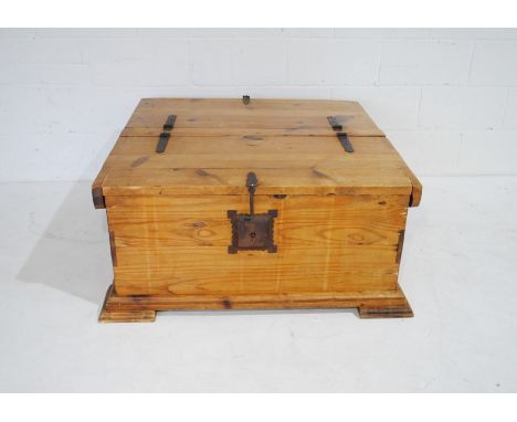 A double sided lockable lidded pine trunk with keys - length 110cm, depth 102cm, height 46cm