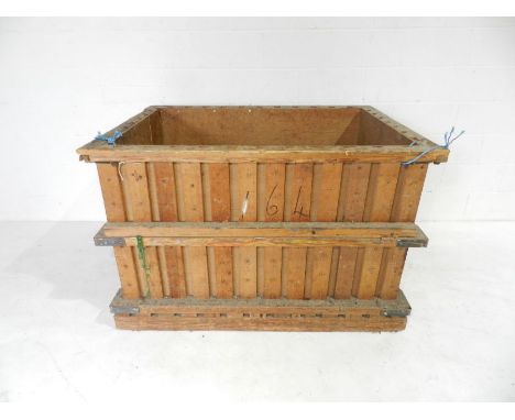 An Axminster Carpets large bobbin crate, with drop down front - length 145cm, depth 105cm, height 94cm