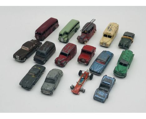 A small collection of vintage play worn die-cast vehicles including Dinky Toys, Corgi Toys, Spot-On by Tri-ang etc