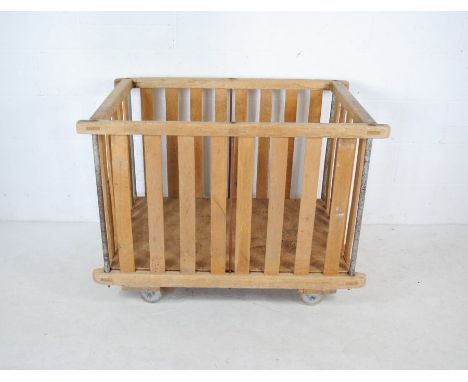 A vintage factory wooden slatted bobbin trolley originally from Axminster Carpets- length 118cm, depth 70cm, height 82cm