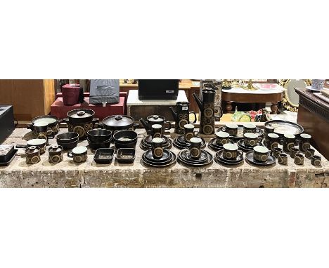 A large Denby "Arabesque" part dinner service including coffee pot, teapot, dinner plates, casserole dishes, bowls, cups, sau