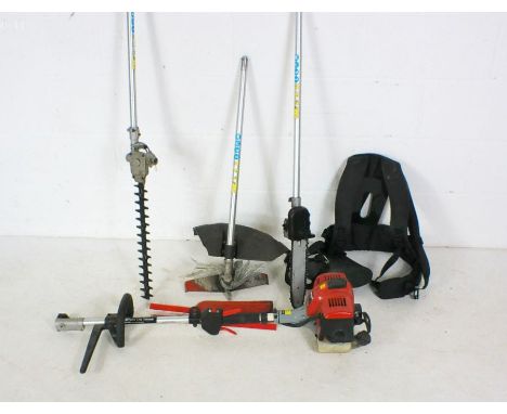 An Axminster Tool Centre J260 petrol multitool with strimmer, chainsaw, hedge trimmer attachments and harness. 