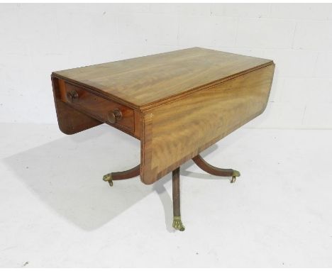 A Regency mahogany sofa table with single drawer and faux drawer