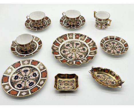 A collection of Royal Crown Derby Imari pattern china including cups, saucers, loving cup, bon-bon dishes etc. 