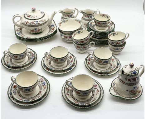 Copeland Spode Chinese Rose tea and dinner ware, comprising ten trios, tea plates, sugar bowls, teapot, lidded jug etc. 