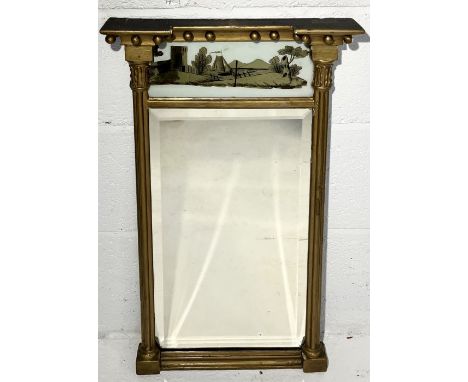 A Georgian gilt mirror with reverse painted panel to top showing a maritime scene 68cm x 35cm