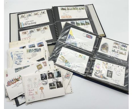 A collection of first day covers loose and in two albums 