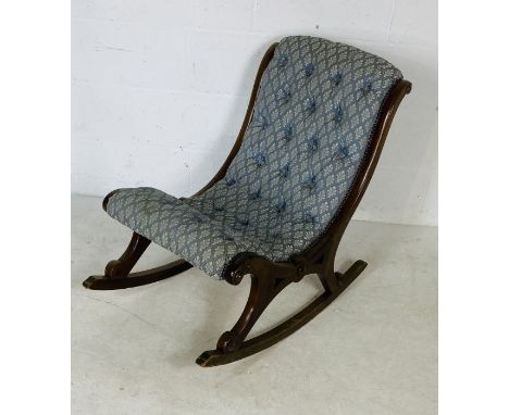 A Victorian button back rocking nursing chair