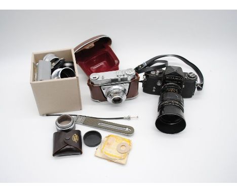 A Miranda No. 702569 film camera along with a Kodak Retinette 1A film camera and a quantity of lens parts and accessories etc