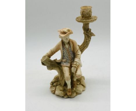 A Royal Worcester candlestick figure of a seated gentleman