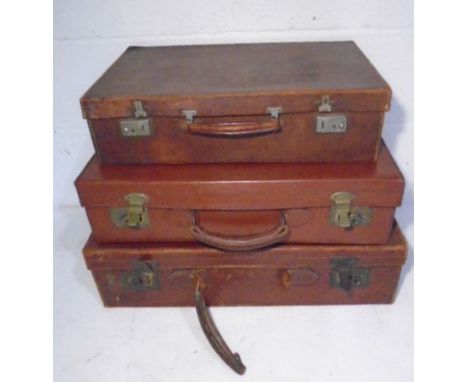 Three vintage leather suitcases (A/F)