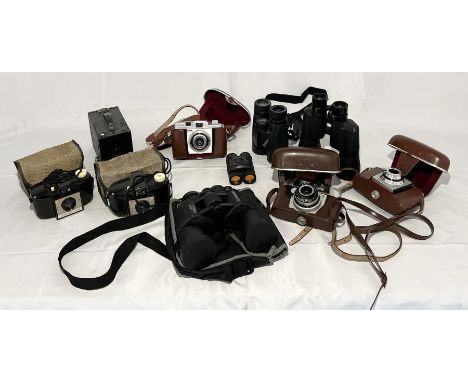 A collection of various vintage cameras and binoculars including Kodak, Bresser, Lieberman &amp; Gortz etc. 